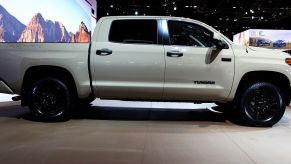 A white Toyota Tundra on display during an auto show