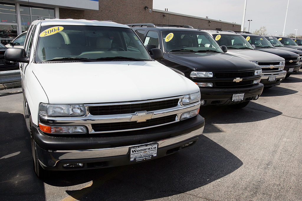A car dealership offering used Chevy Tahoes