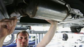 A car mechanic working on a car