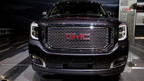 A 2015 GMC Yukon on display at an auto show