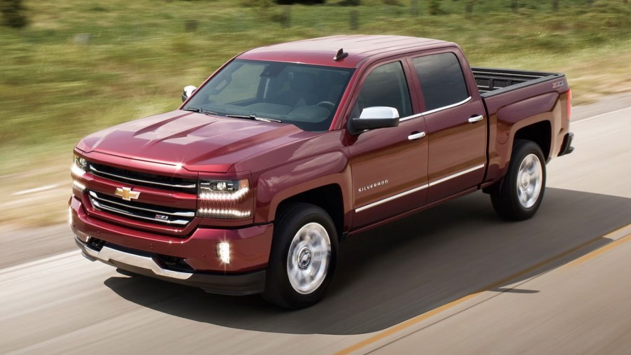 The 2016 Chevy Silverado driving down the road