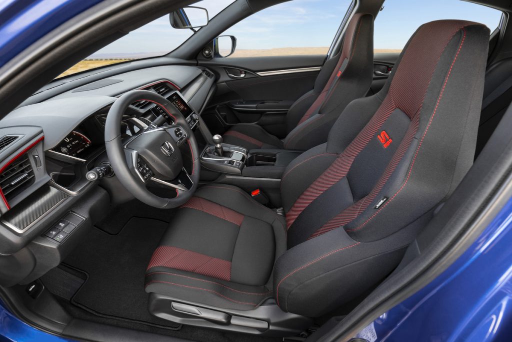 2020 Honda Civic Si Sedan interior with red stitching.