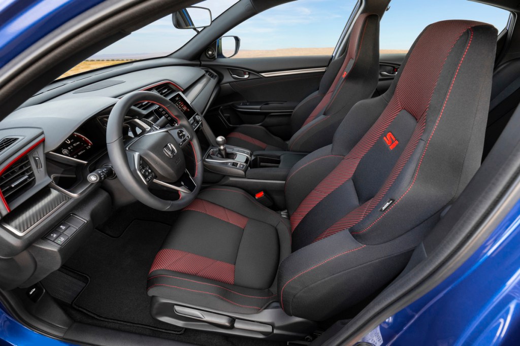 2020 Honda Civic Si Sedan interior with red stitching.