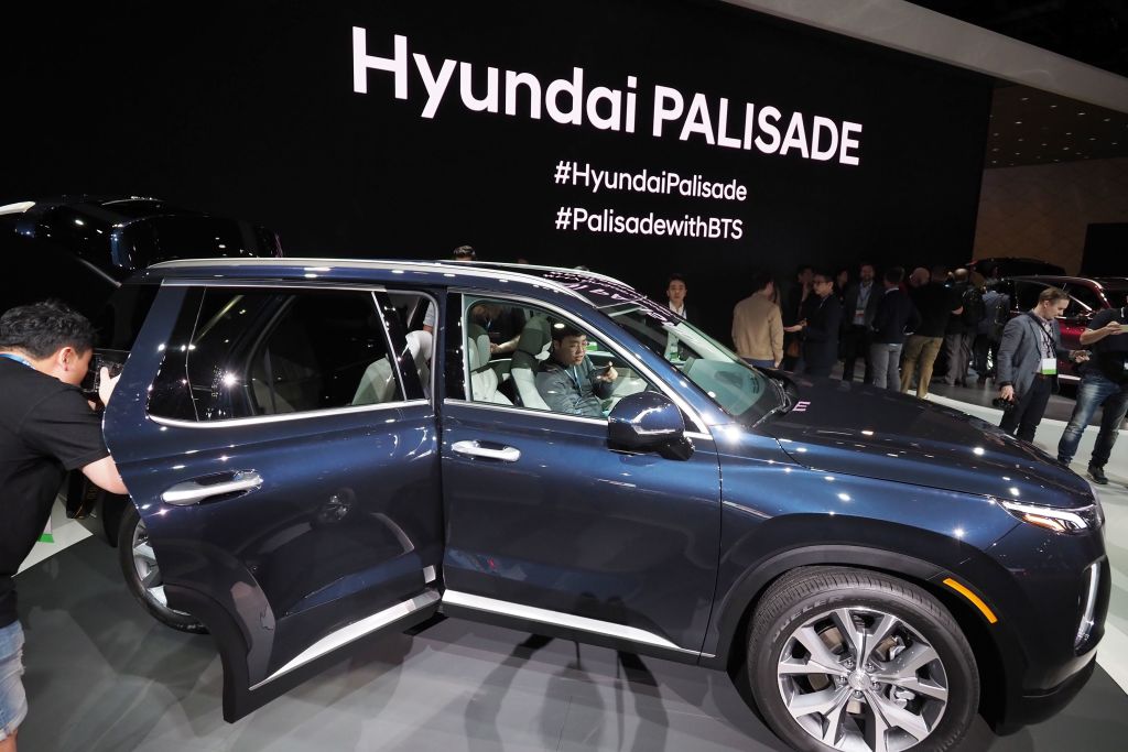 Attendees get a closer look at the 2020 Hyundai Palisade SUV after it was unveiled at AutoMobility LA