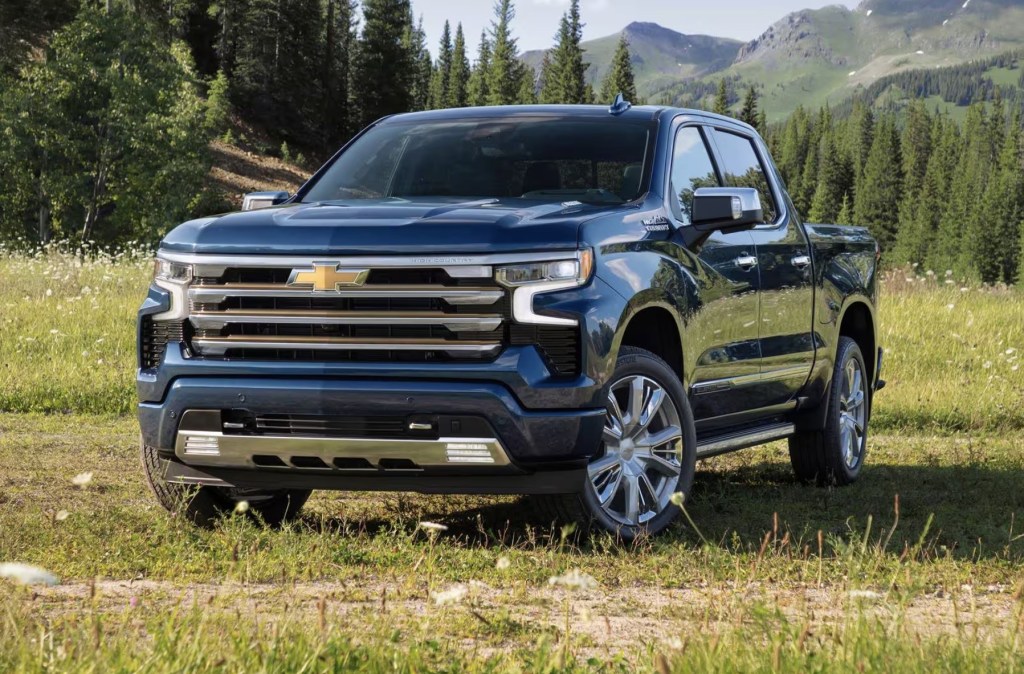 The 2023 Chevy Silverado parked in a field