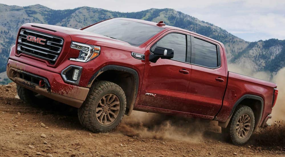 The 2023 GMC Sierra 1500 off-roading in the dirt 