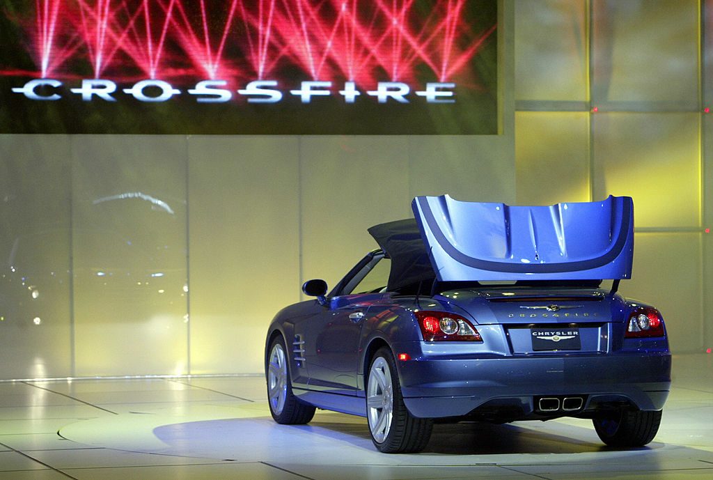 DETROIT, UNITED STATES:  The new Chrysler Crossfire convertible shown 06 January 2004 during the press days at the North American International Auto Show at Cobo Hall in Detroit, Michigan.  AFP PHOTO/Jeff HAYNES  (Photo credit should read JEFF HAYNES/AFP via Getty Images)
