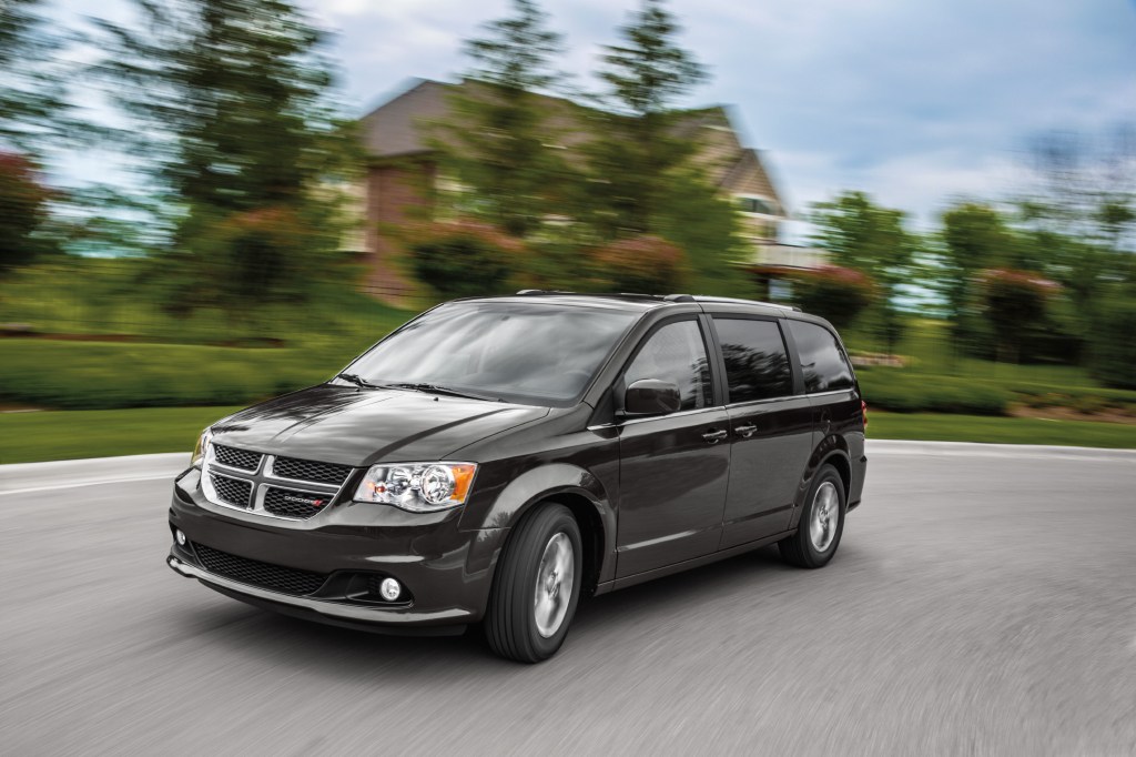 the Dodge Caravan in motion, a wise and practical family vehicle