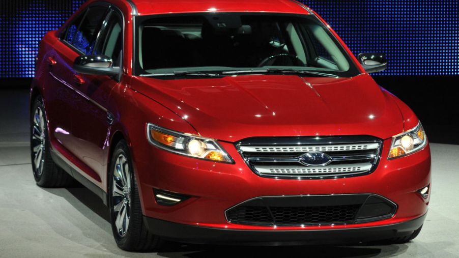 A Ford Taurus on display at an auto show