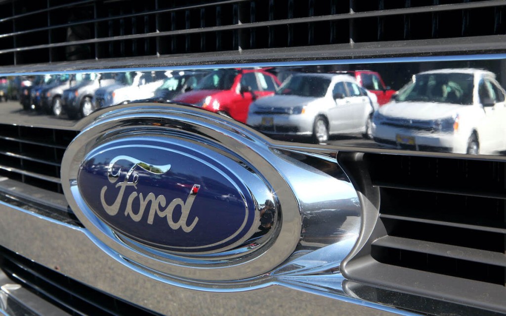 A Ford emblem on the front of one of its vehicles.