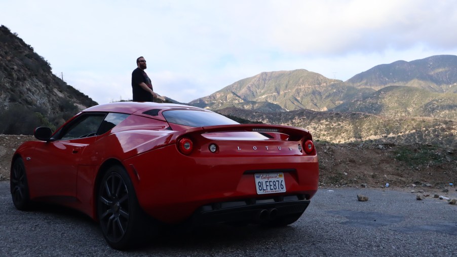 Ryan Horan stands admiring the scenery of the Angeles Crest Highway as we admire our new Lotus Evora | Gabrielle R DeSantis