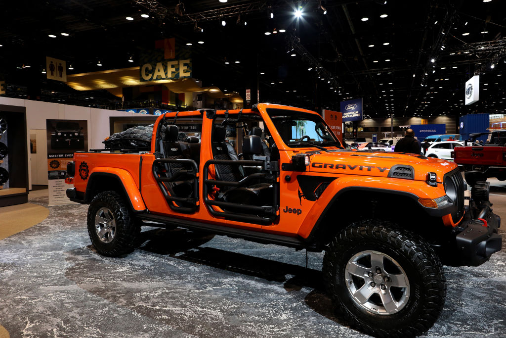 A 2020 Jeep Gladiator on display at an auto show