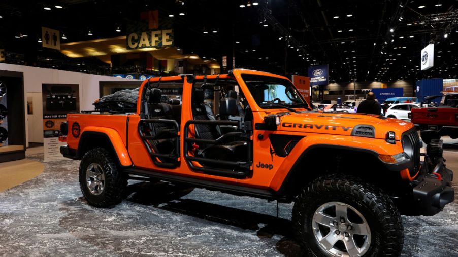 A 2020 Jeep Gladiator on display at an auto show