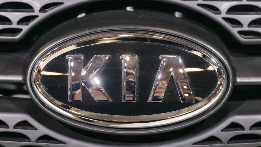 A Kia logo shown on the front of a car