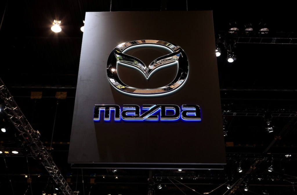 A Mazda sign at an auto show
