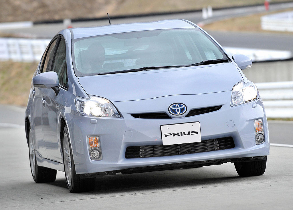 A person taking a Toyota Prius on a test drive