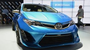 A Toyota made Scion car on display at an auto show