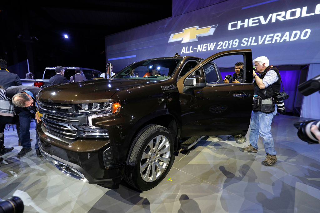Journalists check out the new 2019 Chevrolet Silverado 1500 after its official debut at the 2018 North American International Auto Show