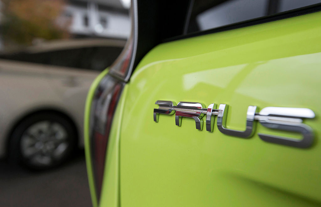A prototype of Toyota Motor Corp.'s fourth-generation Prius hybrid vehicle sits parked ahead of the test drive at the Fuji Speedway