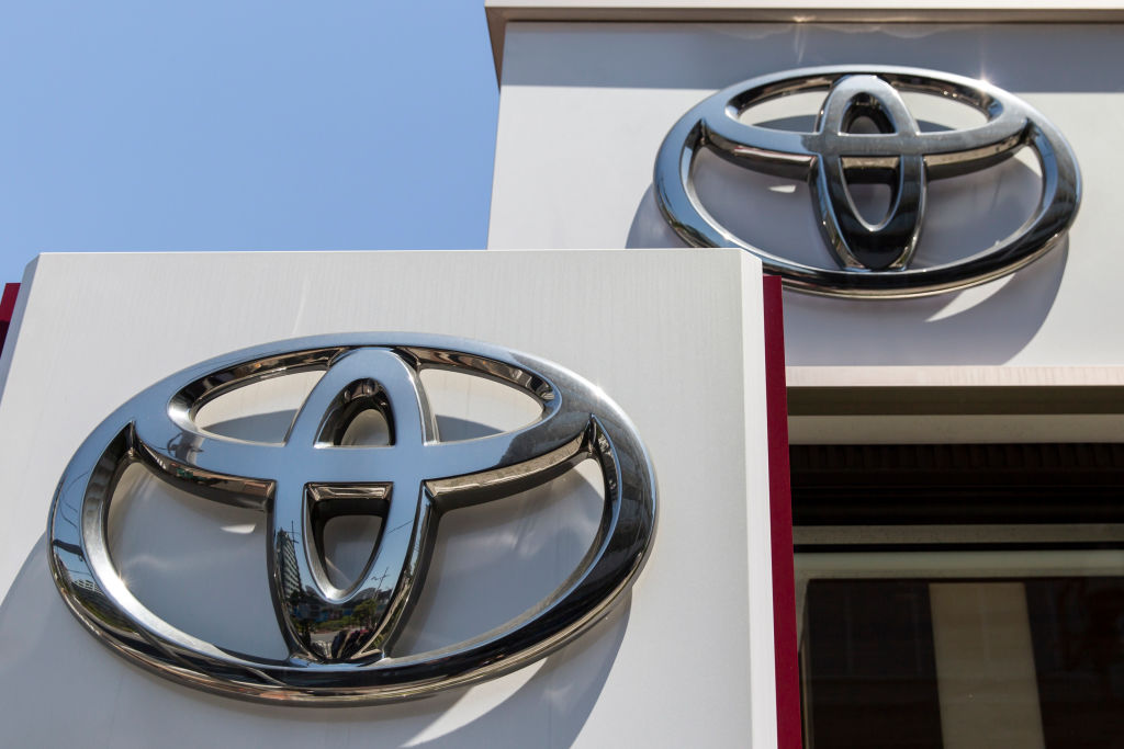 Toyota Motor Corp. logos are displayed outside one of the company's dealerships on May 8, 2019 in Tokyo, Japan