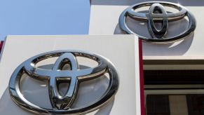Toyota Motor Corp. logos are displayed outside one of the company's dealerships on May 8, 2019 in Tokyo, Japan