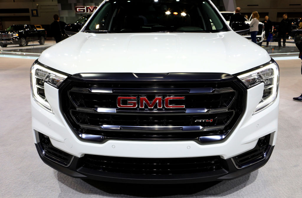 A new 2020 GMC Terrain on display at an auto show