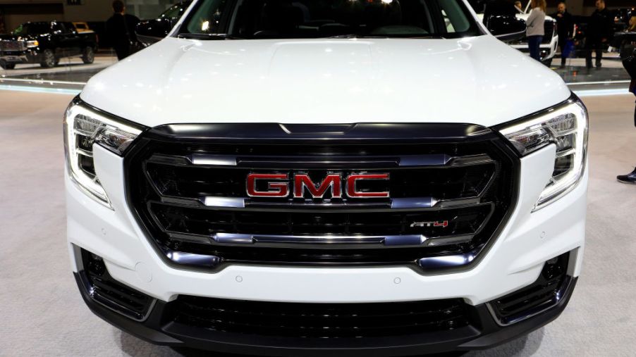 A new 2020 GMC Terrain on display at an auto show