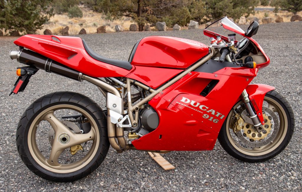 Red 1997 Ducati 916S with golden wheels