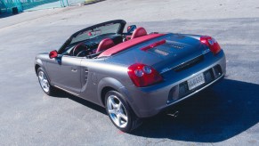 A silver 2004 Toyota is parked in a parking lot.