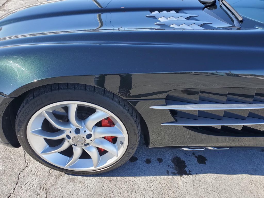 A close-up of the front fender on a 2006 Mercedes-Benz SLR McLaren.