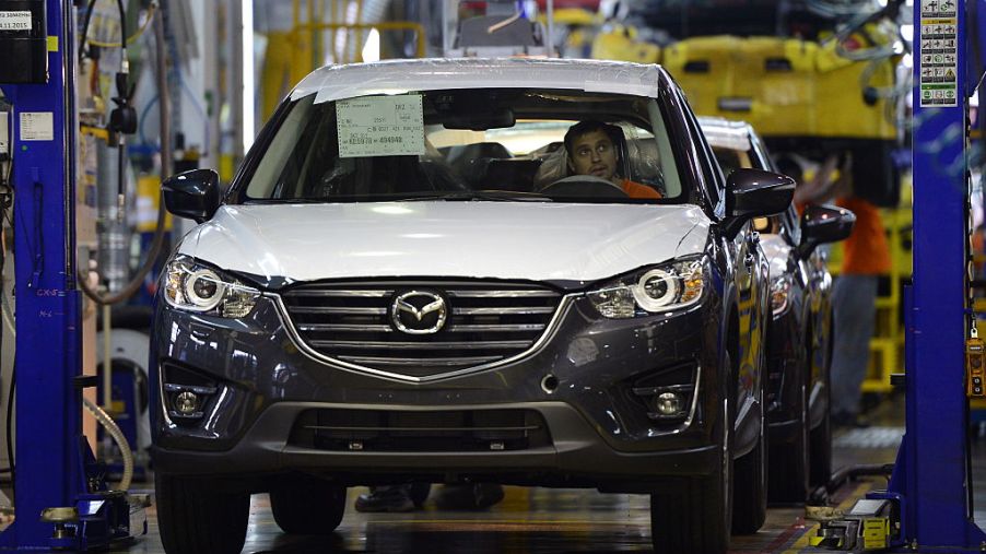Mazda cars being produced at a factory