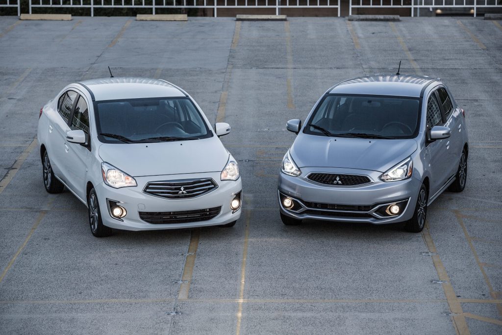 A 2020 Mitsubishi Mirage G4 sedan and 2020 Mitsubishi Mirage hatchback parked in a parking lot.