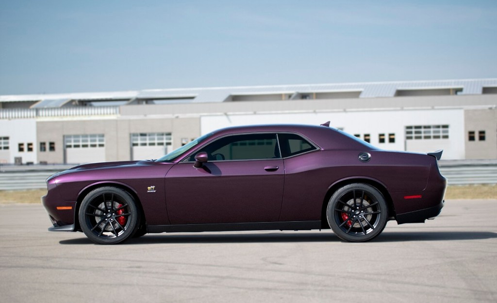 A Dodge Challenger R/T Scat Pack 1320 shows off its purple paintwork.