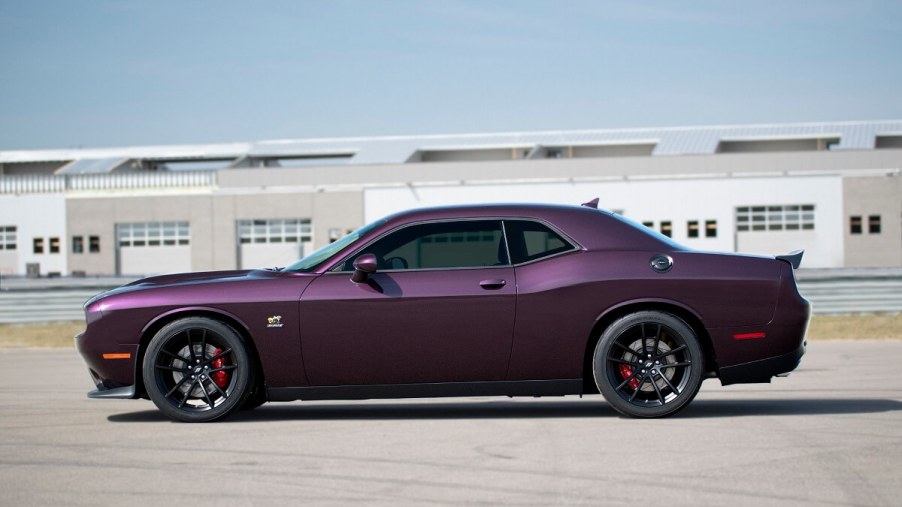 A Dodge Challenger R/T Scat Pack 1320 shows off its purple paintwork.