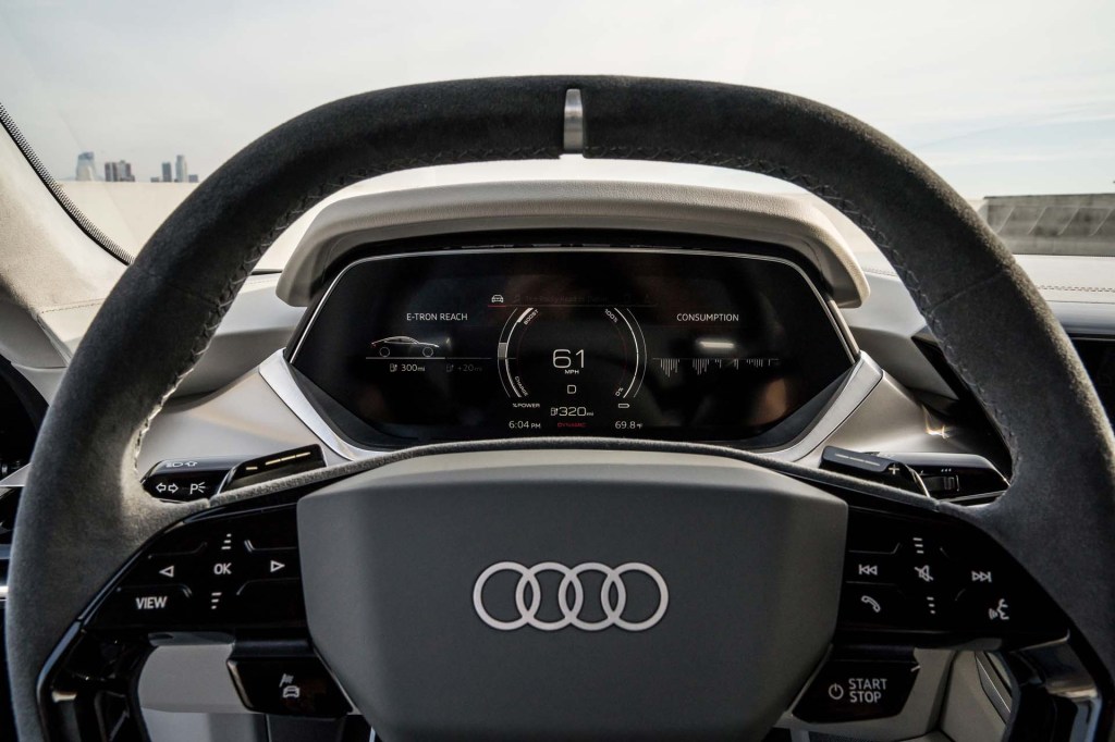 A black matte Audi e-tron steering wheel.