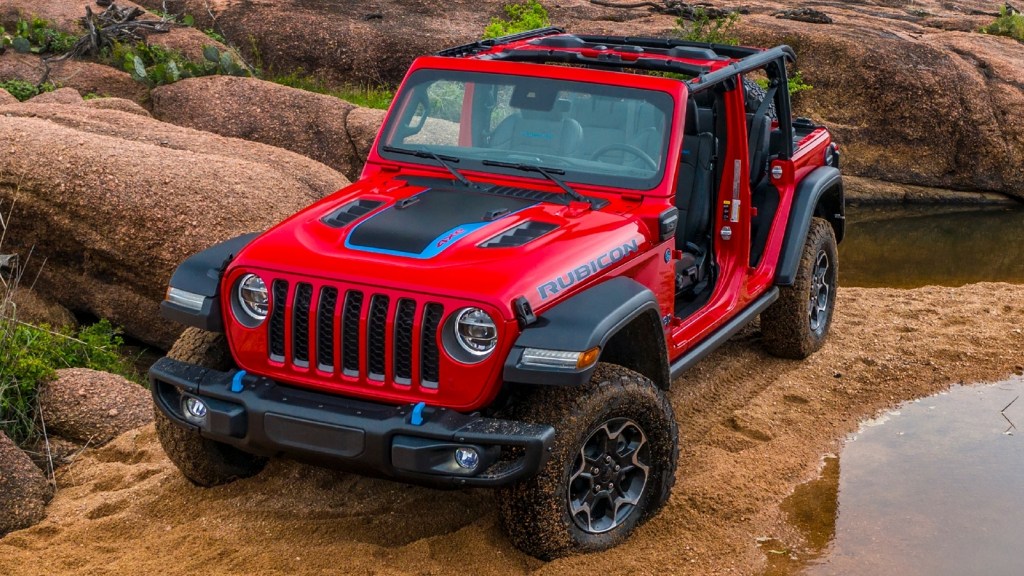 The 2023 Jeep Wrangler 4xe off-roading in sand 