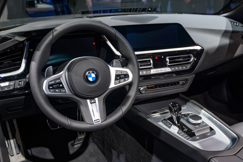 An interior view of the driver's side of a BMW Z4 Roadster on display at a car show