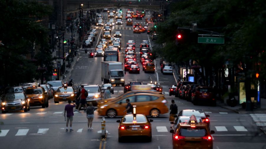 Traffic moves along 42nd Street at sunset on June 2, 2019 in New York City