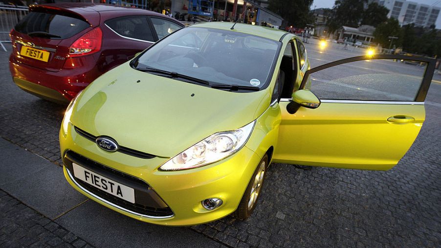 A lime green Ford Fiesta