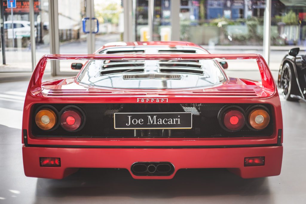 The rear of a 1988 red Ferrari F40.
