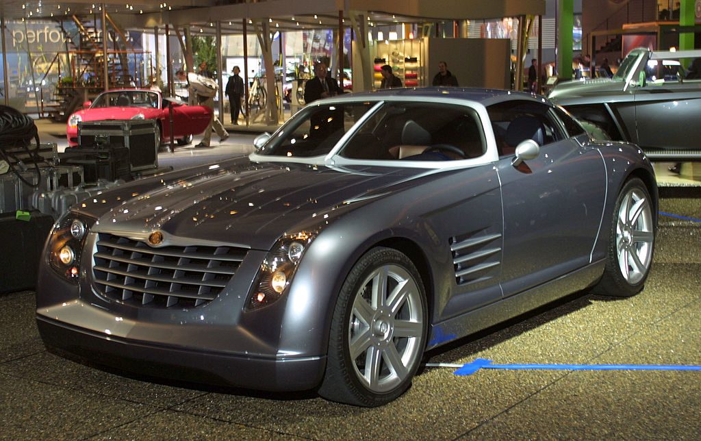 A silver 2002 Chrysler Crossfire concept car on display at the North American International Auto Show in 2001.