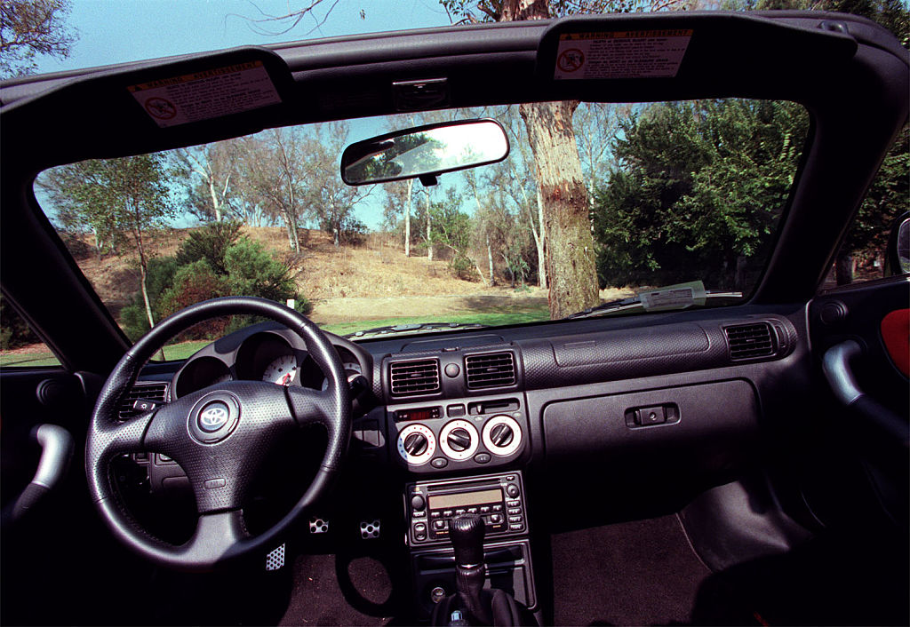 A close-up of a Toyota MR2 Spyder's dashboard.