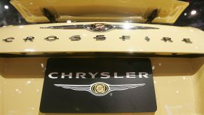 NEW YORK - APRIL 04: A Chrysler logo is seen on a Chrysler Crossfire sportscar at the New York International Auto Show April 4, 2007 in New York City. DaimlerChrysler AG acknowledged today it was talking to possible buyers of its money-losing Chrysler unit. The show opens to the public April 6, 2007. (Photo by Mario Tama/Getty Images)