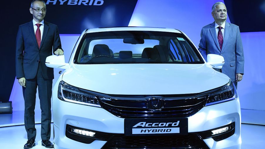 Yoichiro Ueno, President and CEO of Honda Cars India Ltd., and Raman Sharma, Director of Corp. Affairs Honda Cars India Ltd., during the launch of the all new Honda Accord Hybrid Feather Car
