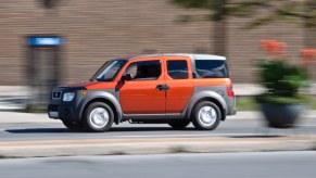 The Honda Element driving on the road