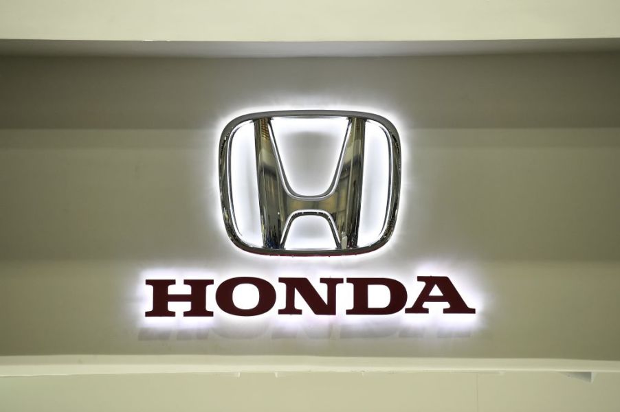 A Honda logo on a wall