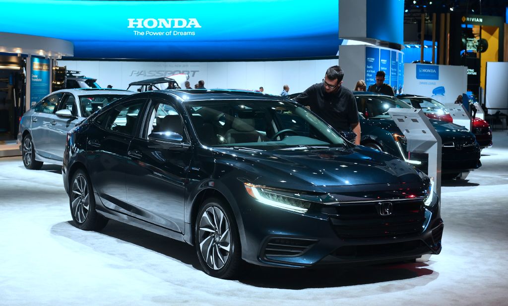 A man views the Honda Insight, named Green Car of the Year, on display in Los Angeles, California