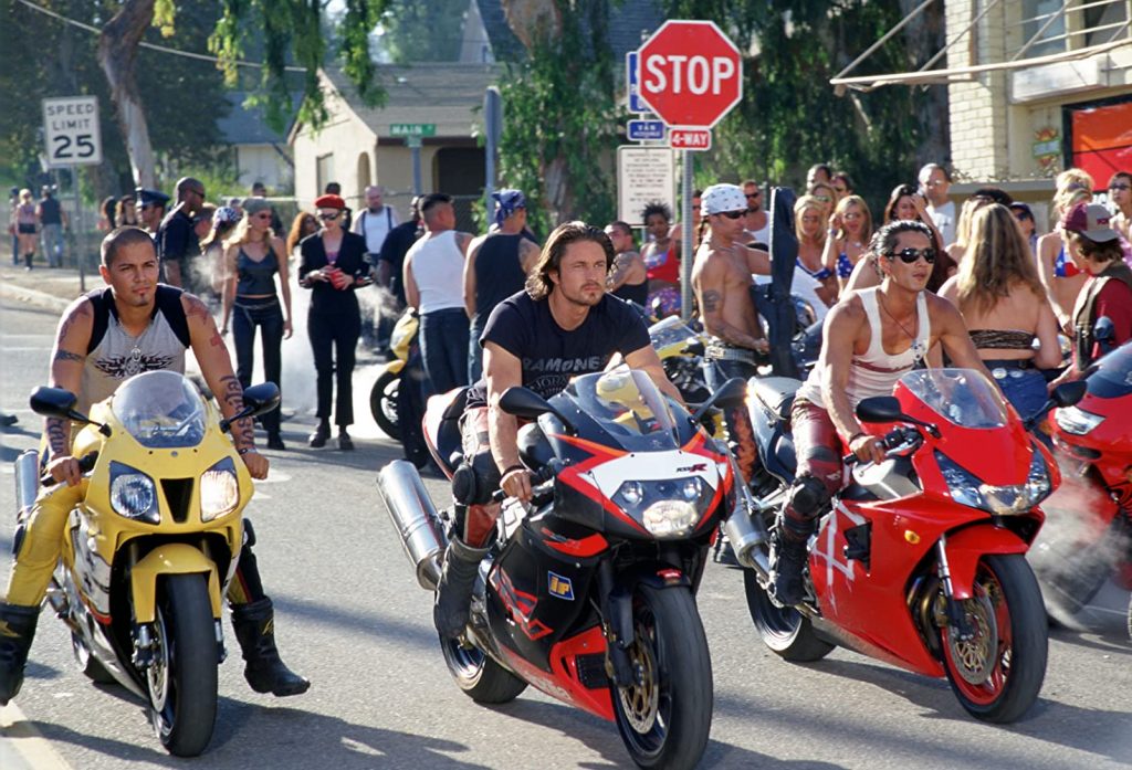 A scene from the 2004 movie Torque in which three motorcycle racers are lined up.