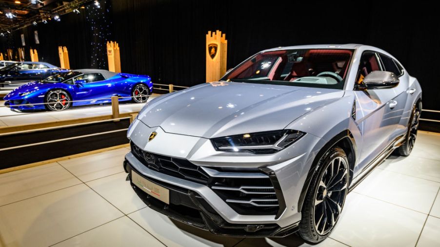 A new Lamborghini Urus on display at an auto show