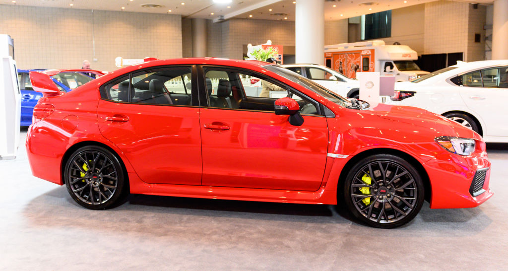 A new Subaru WRX STI on display at an auto show
